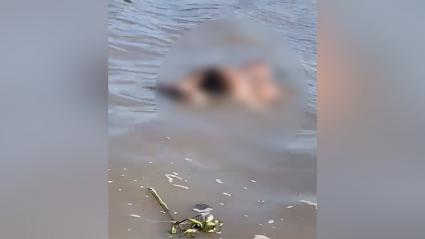 Aspecto del cuerpo sin vida descubierto en las aguas del río Magdalena